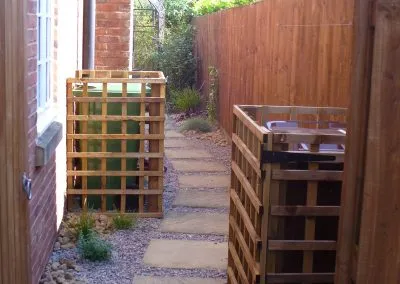 Alley way with fresh paving stones and nice bin storage