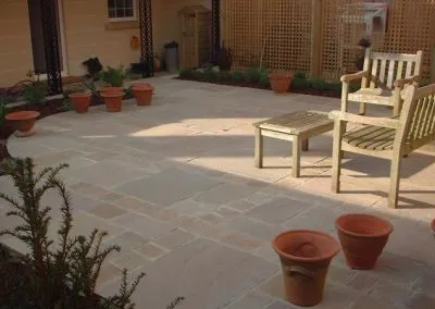 Paving stones in landscaped garden