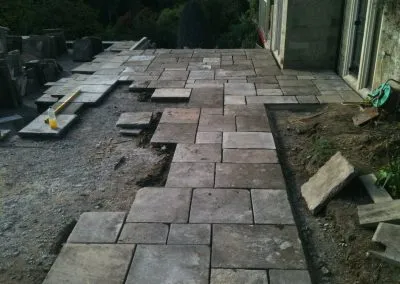 paving slabs being placed